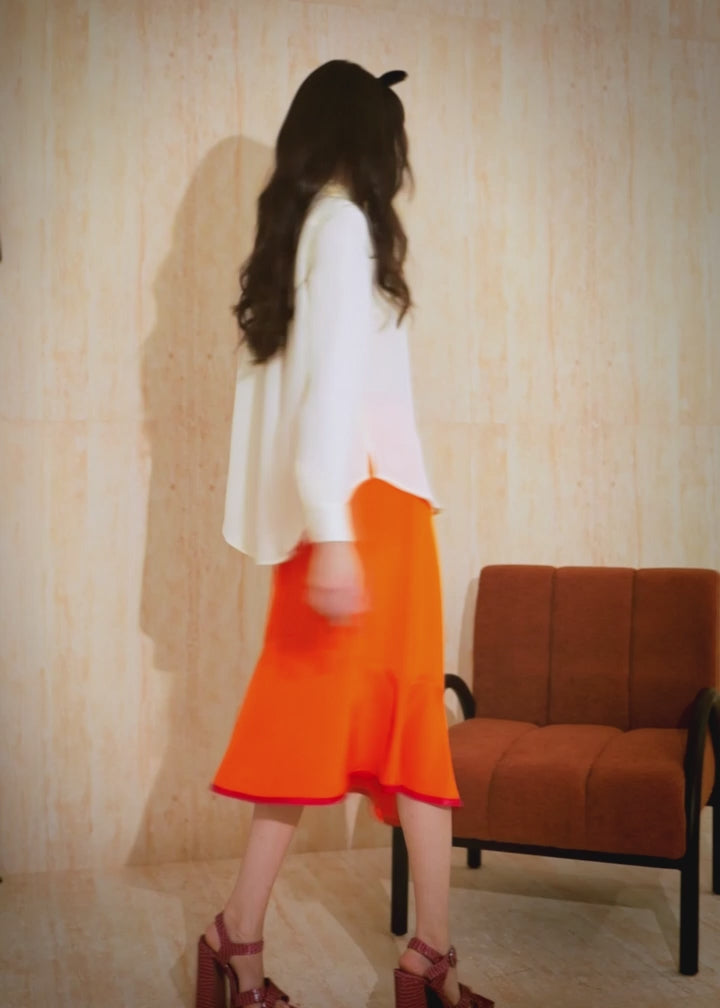 
                  
                    Load and play video in Gallery viewer, Fly Skirt - Orange
                  
                