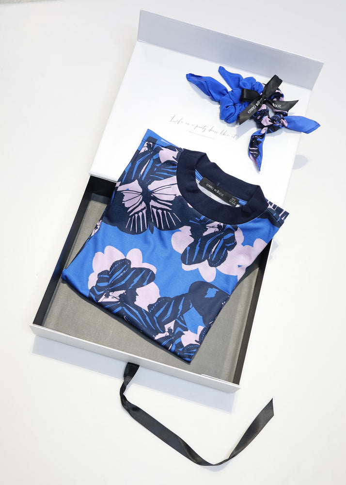 
                  
                    Nymphali Tee and Scrunchies Set
                  
                